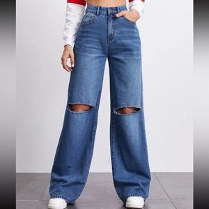 pre loved high waist dark wash blue jeans, ripped at the knees